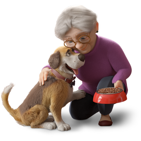Femme âgée nourissant son chien